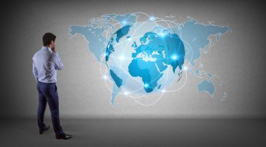 Bir duvar 3d re dijital planet earth arabirimini kullanarak iş adamı
