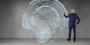 Bir duvar 3d re dijital planet earth arabirimini kullanarak iş adamı