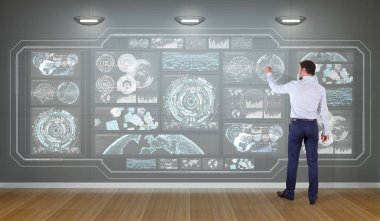 Bir duvara 3d render grafik ekranlar arabirimini kullanarak iş adamı