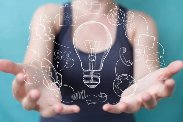 Businesswoman touching and holding sketch lightbulb — Stock Photo, Image