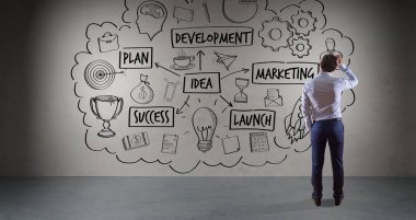 Bir duvara 3d işleme eskiz bir proje izlerken işadamı