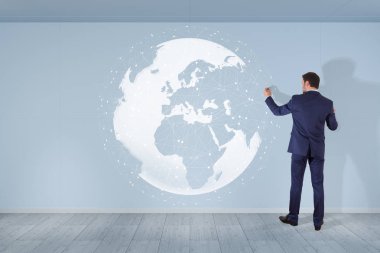 Bir duvar 3d re dijital planet earth arabirimini kullanarak iş adamı