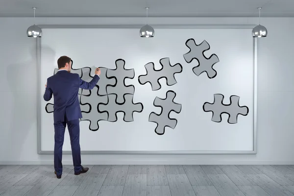 Homme d'affaires recherche puzzle solution sur un mur rendu 3D — Photo