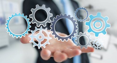 Simgeleri çizilmiş tutan işadamı vites