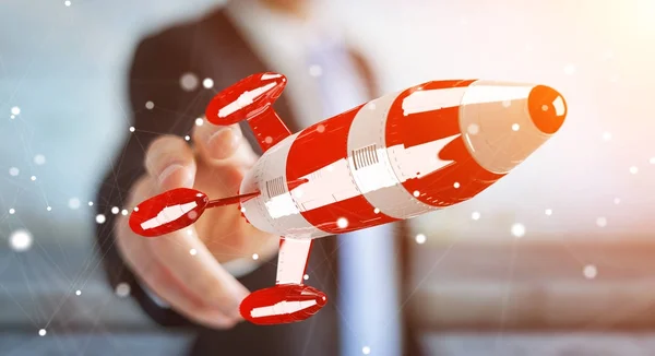 Бізнесмен тримає червону ракету в руці 3D рендеринга — стокове фото