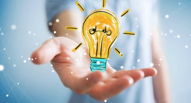 Holding ve bir ampul dokunmadan işadamı kroki