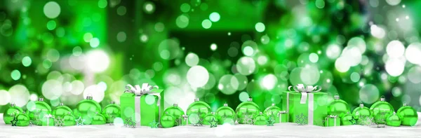 Green and white christmas gifts and baubles lined up 3D renderin