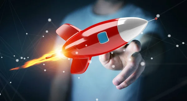 Empresário segurando e tocando um foguete 3D renderização — Fotografia de Stock