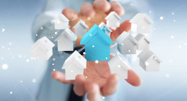 Бізнесмен використовує 3D візуалізовані маленькі біло-блакитні будинки — стокове фото