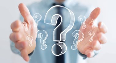 Elle çizilmiş soru işaretleri tutan işadamı