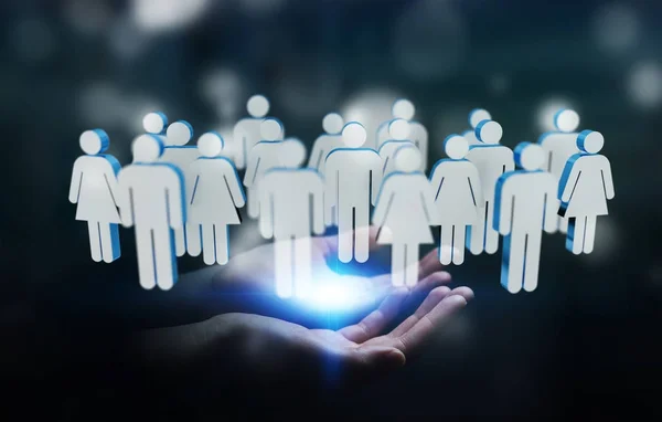 Affärsman som håller 3d rendering grupp människor i handen — Stockfoto