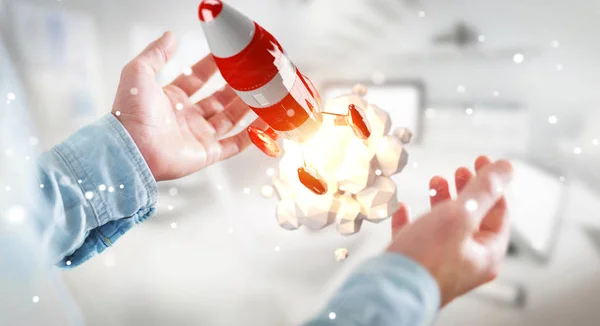 Zakenman die houdt van rode raket in zijn hand 3D-rendering — Stockfoto