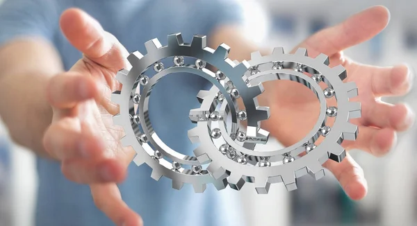 Empresario que utiliza el mecanismo de engranaje moderno flotante 3D renderizado —  Fotos de Stock