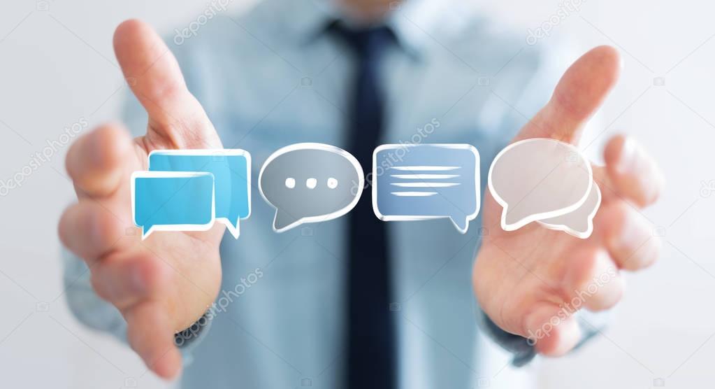Businessman holding discussion icons sketch