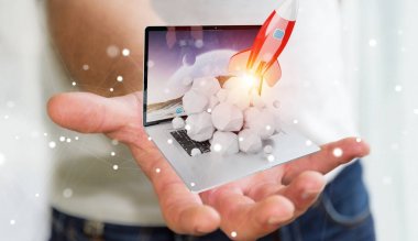 Bir laptop 3d render roket başlatılması ile iş adamı