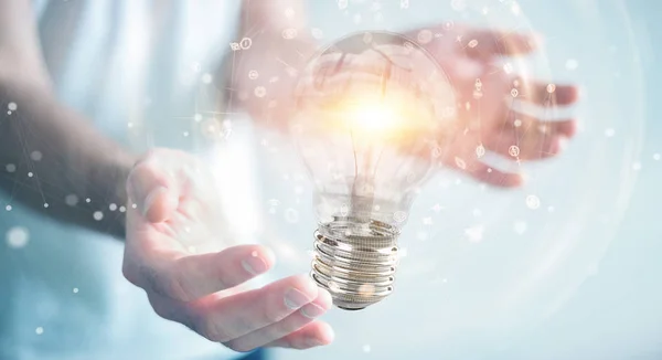 Empresario conectar bombillas modernas con conexiones 3D ren —  Fotos de Stock