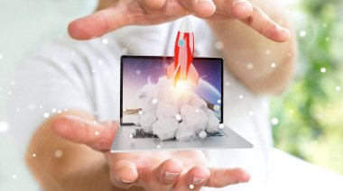 Bir laptop 3d render roket başlatılması ile iş adamı