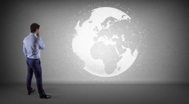 Bir duvar 3d re dijital planet earth arabirimini kullanarak iş adamı
