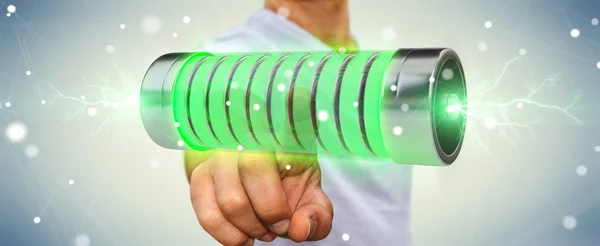 Uomo d'affari utilizzando batteria verde con lampi rendering 3D — Foto Stock