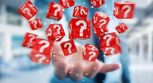 Businessman using cubes with 3D rendering question marks — Stock Photo, Image