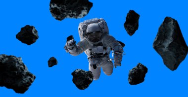 Mavi arka plan 3d işleme öğeleri t üzerinde izole astronot