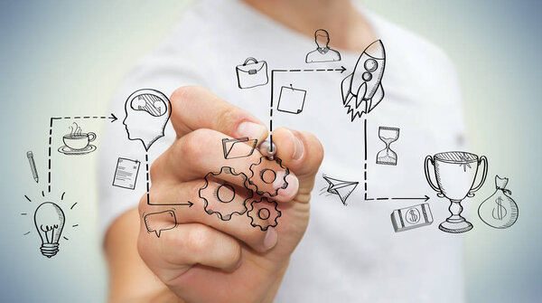 Businessman drawing manuscript project presentation with a pen