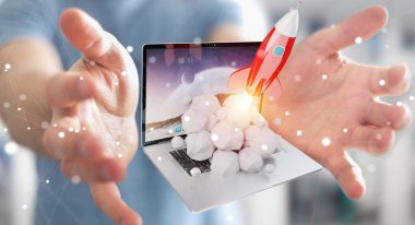 Bir laptop 3d render roket başlatılması ile iş adamı