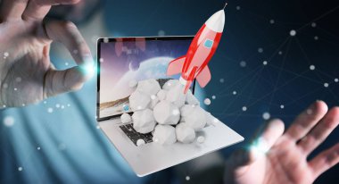 Bir laptop 3d render roket başlatılması ile iş adamı