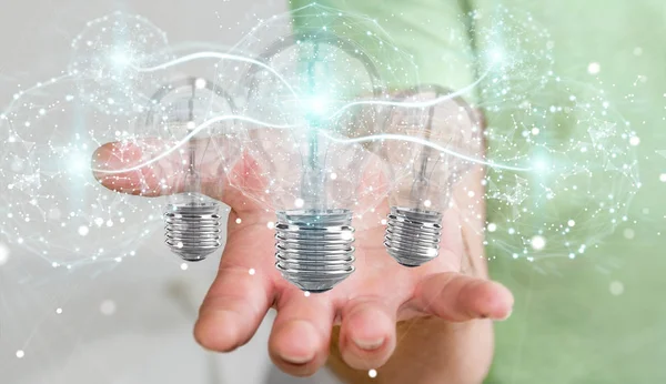 Empresario conectar bombillas modernas con conexiones 3D ren —  Fotos de Stock