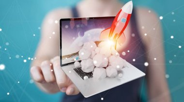 Bir laptop 3d render roket başlatılması ile iş kadını
