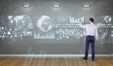 Bir duvara 3d render grafik ekranlar arabirimini kullanarak iş adamı