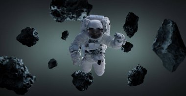 Gri arka plan 3d işleme öğeleri t üzerinde izole astronot