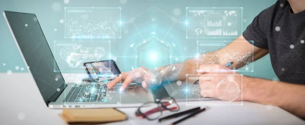 Graphic designer using digital screens interface with holograms — Stock Photo, Image