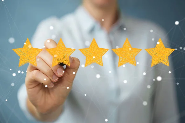 Businesswoman rating with hand drawn stars — Stock Photo, Image