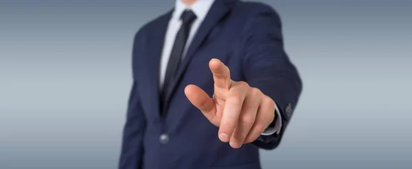 Businessman pointing finger — Stock Photo, Image