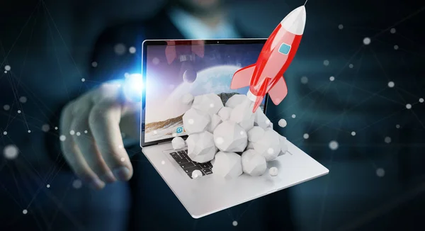 Businessman with rocket launching from a laptop 3D rendering — Stock Photo, Image