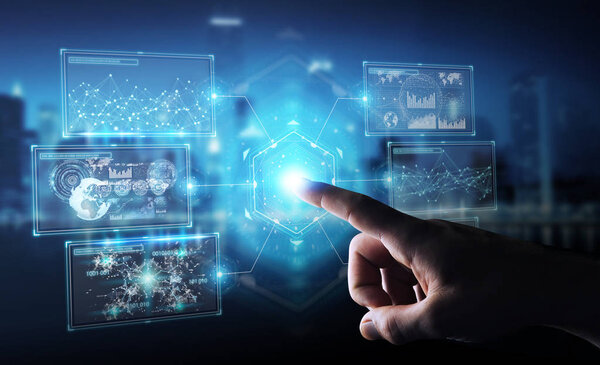 Businessman using digital screens interface with holograms datas