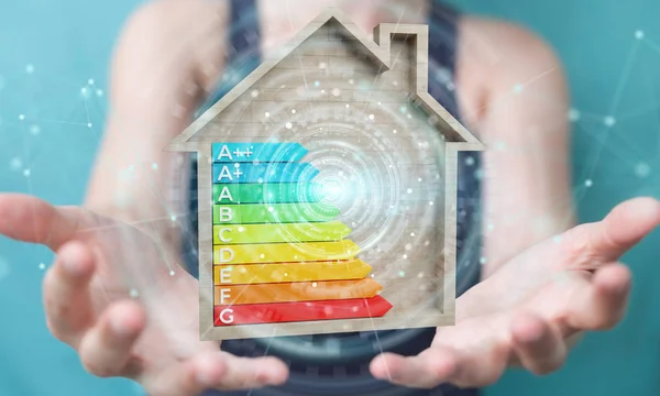 Forretningskvinde ved hjælp af 3D rendering energi rating diagram i et træ - Stock-foto