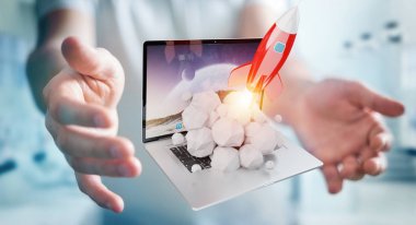 Bir laptop 3d render roket başlatılması ile iş adamı