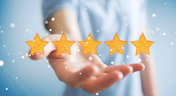 Рейтинг бизнесмена с нарисованными звездами
 