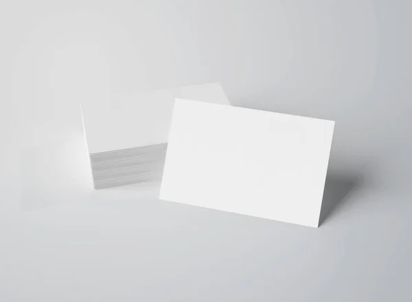 Pilha de branco cartões de visita mockup isolado no branco 3d render — Fotografia de Stock