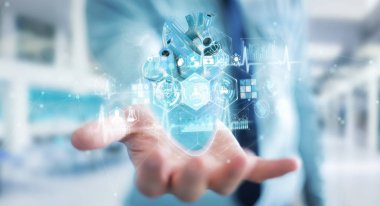 İnsan kalbi holografik tarama projeksiyonunun röntgenini kullanan bir adam.