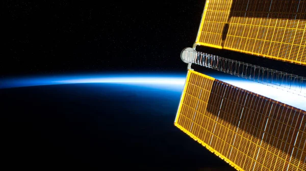 View of planet Earth horizon from a space station window during — Stock Photo, Image