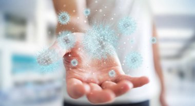 Dijital holografik projeksiyonla bakterileri analiz eden adam.