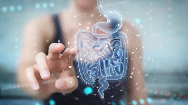 Женщина с помощью цифрового рентгена человеческого кишечника — стоковое фото