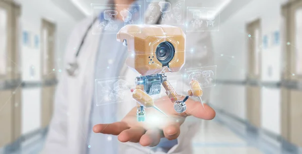Doctor holding and touching futuristic nanorobot with graph anal — 스톡 사진