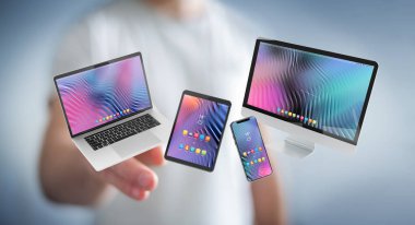 Modern akıllı telefon tablet dizüstü bilgisayarı ve 3D görüntülemesini birbirine bağlayan bulanık arkaplan üzerindeki işadamı