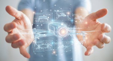 Bulanık arka plan tutuşu ve ellerindeki holografik insansız hava aracı projeksiyonuna dokunan iş adamı