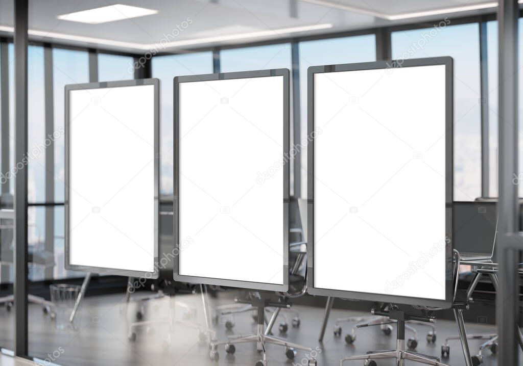 Three white frames Mockup hanging on office glass window. Mock up of a billboards in modern company interior