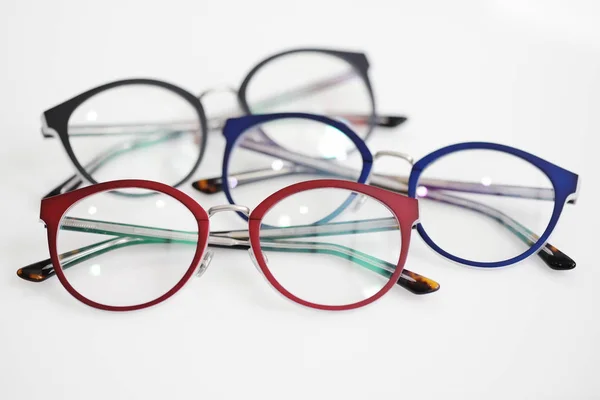 Multicolored glasses on the white background Stock Image